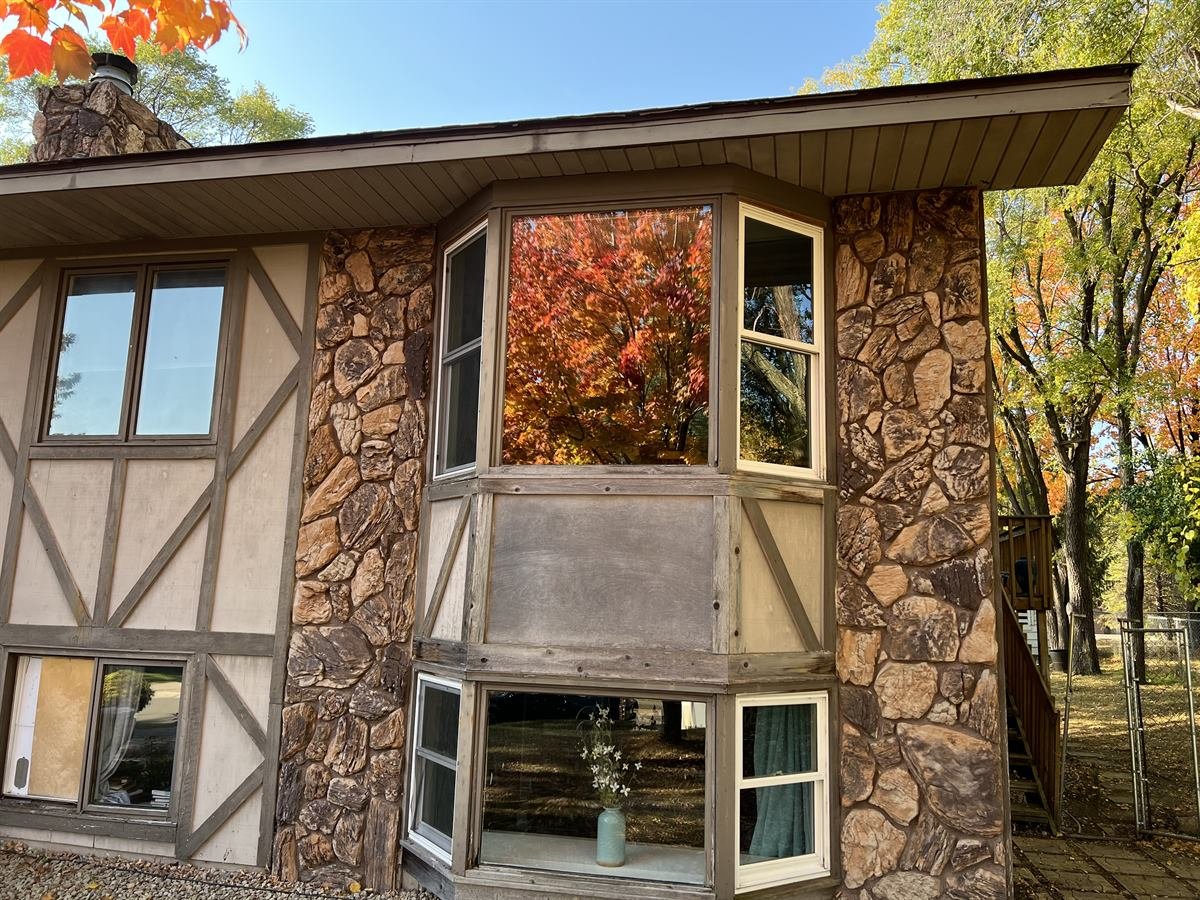 The same windows after cleaning, clear enough to see straight through into the rooms